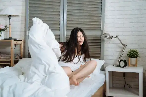 Image of woman getting up because of nighttime leaks Middlesbrough